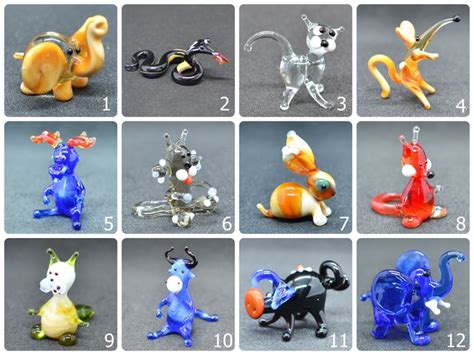 twelve glass figurines of different types and sizes are shown in this ...