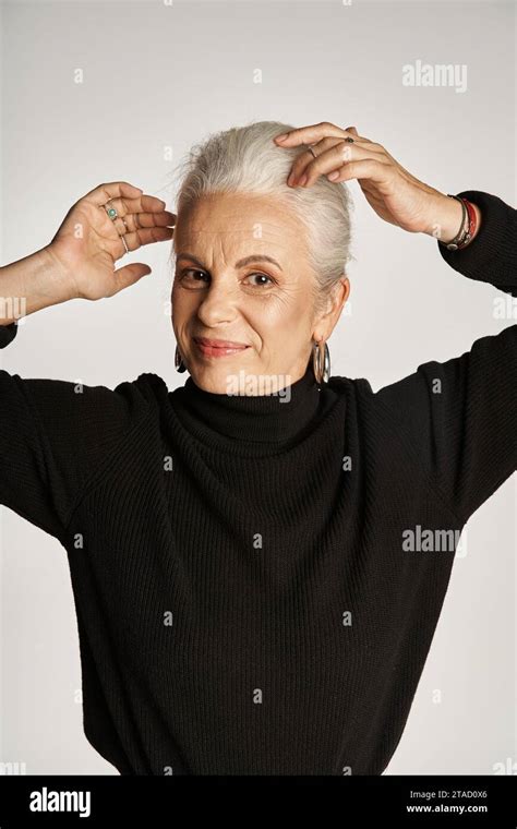 Portrait Of Happy Middle Aged Business Woman In Elegant Attire And Hoop