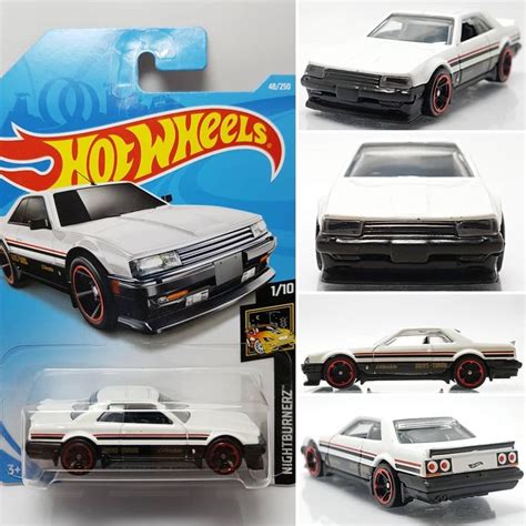 The Hot Wheels Car Is White And Has Red Rims