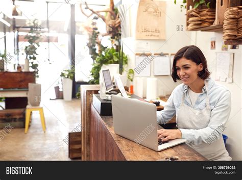 Female Sales Assistant Image And Photo Free Trial Bigstock