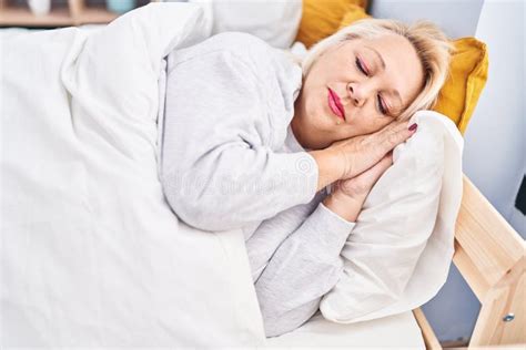 Middle Age Blonde Woman Sleeping Lying On Bed At Bedroom Stock Image Image Of Plus Senior