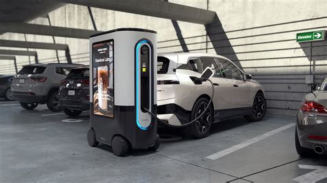 Ziggy Mobile Ev Charging Robot With Interactive Advertising Platform