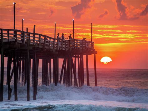 Sunrise Over Fishing Pier At North Carolina Outer Banks Photograph