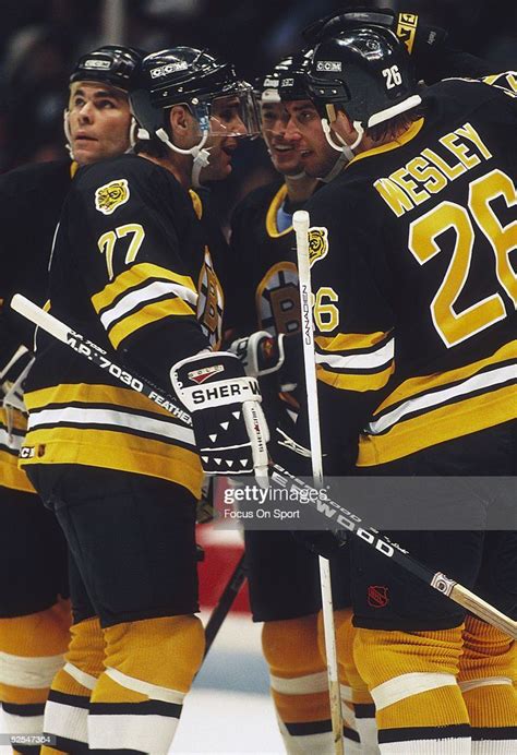 Boston Bruins' captain Ray Bourque is congraulated after scoring... in ...