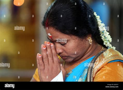 Sri Veeramakaliamman Hindu Temple Indian Woman Praying Singapore