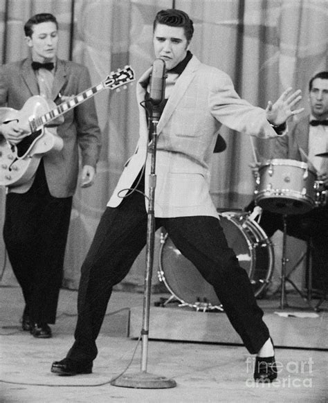 Elvis Presley Performing On Stage by Bettmann