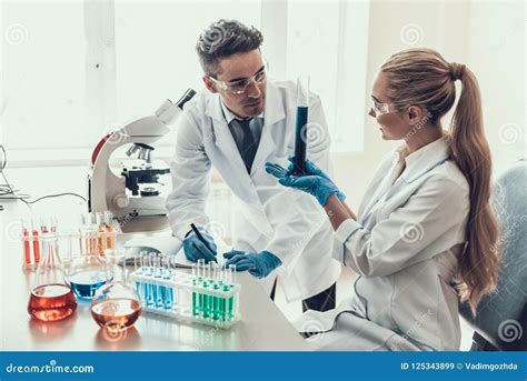 Young Scientists Doing Research In Laboratory Stock Image Image Of