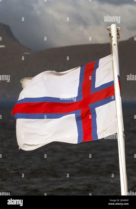 National Flag Of The Faeroe Islands Waving In The Wind Faroe Islands