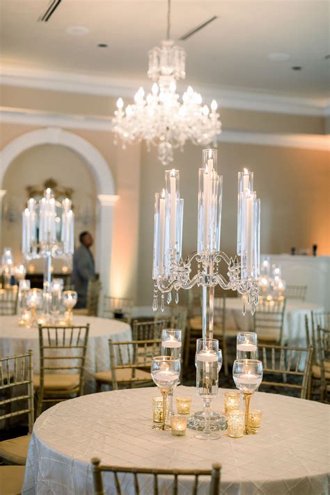 English Turn Wedding Featuring Crystal Candelabra Centerpieces With Gold And Floating Candle