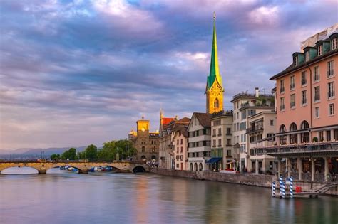 Premium Photo Famous Fraumunster Church And River Limmat At Sunrise