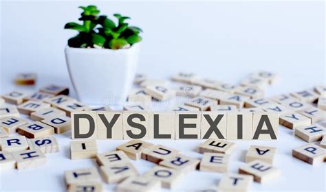 Dyslexie Le Mot Dyslexie Est Composé De Puzzles Jaunes Et Bleus Photo Stock Image Du