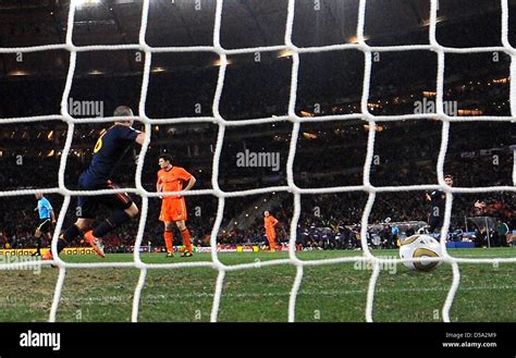 Spain S Andres Iniesta L Celebrates Scoring The Winning Goal