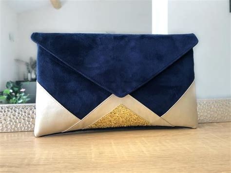 Pochette bleu marine et dorée mariage avec chaîne Mariage bleu marine