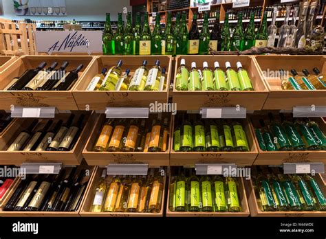 Wine Bottles In A Supermarket Germany Stock Photo Alamy