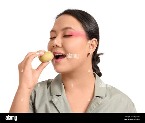 Beautiful Asian Woman Eating Tasty Japanese Mochi On White Background