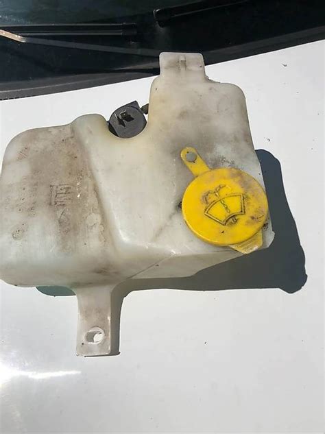 Opel corsa réservoir lave glace Canton Vaud anibis ch