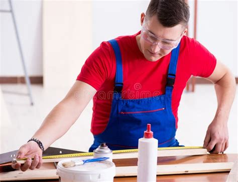 Contractor Working In The Workshop Stock Photo Image Of Coveralls