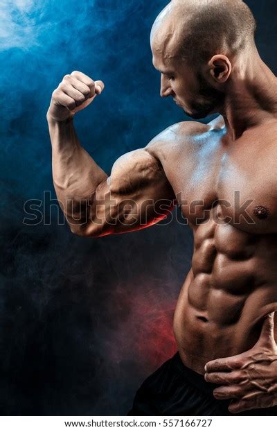 Strong Bald Bodybuilder Six Pack Bodybuilder Stock Photo 557166727