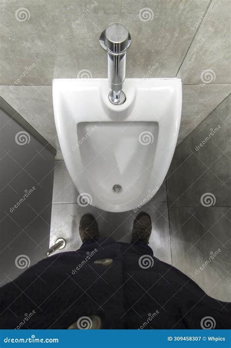 Mature Man In Front Of A Urinal Stock Image Image Of Manual Walls