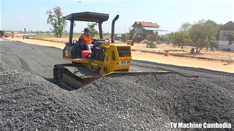 Wonderful Motor Grader And Dozer Spreading Gravel Making Road