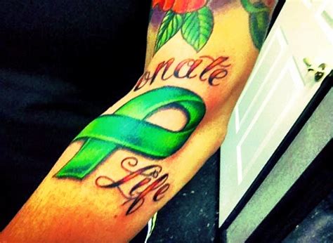 Organ Donor Tattoo With Taurus Symbol And Green Ribbon