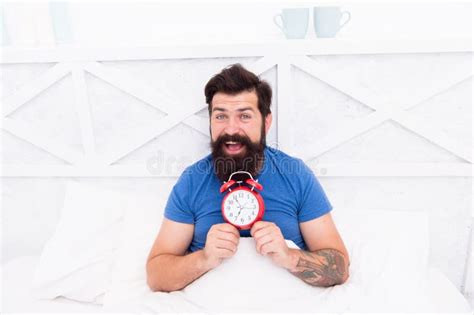 Happy Wake Up Of Man Lying In Bed With Alarm Clock Guy Is Waking Up