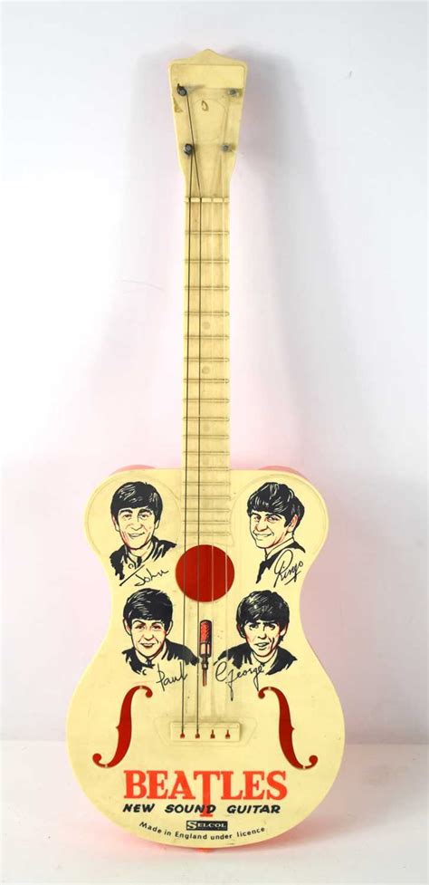 Lot 93 A Vintage Selcol Products Ltd Toy Beatles