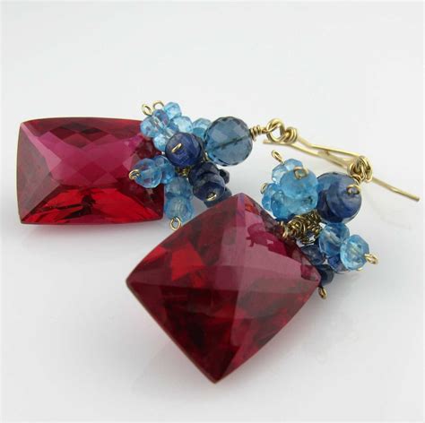 White Cloud Creations Red Topaz Earrings With Blue Topaz Clusters