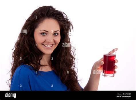 Beautiful Smiling Brunette Woman Is Drinking Red Juice Isolated On