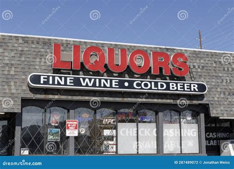 Liquor Store Offering A Variety Of Fine Wines And Cold Beer Display