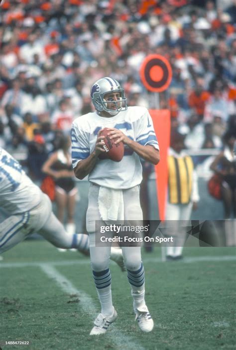 Gary Danielson Of The Detroit Lions Sets Up To Pass Against The News