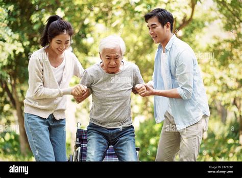 Child helping elderly hi-res stock photography and images - Alamy