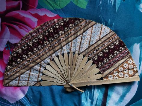 A Hand Fan With A Traditional Indonesian Motif Called Batik Stock Photo