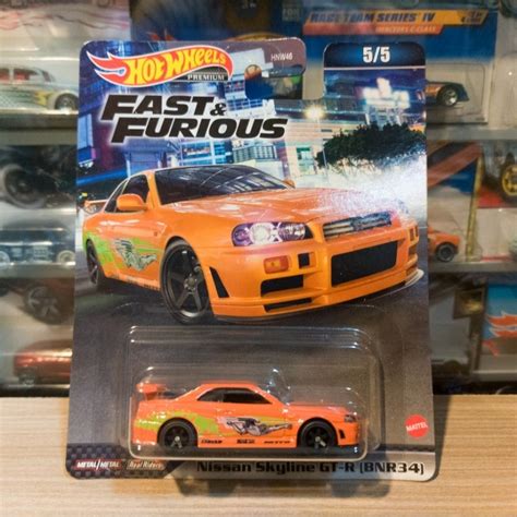 Hot WHEELS NISSAN SKYLINE GT R BNR naranja rápido y furioso PREMIUM Shopee México