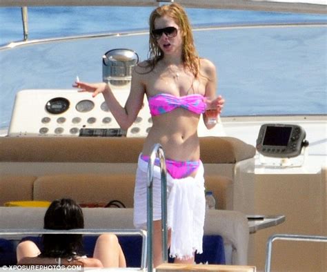 Avril Lavigne Is A Skater Girl With A Soft Side As She Frolics In Pretty Frilly Bikini On Her