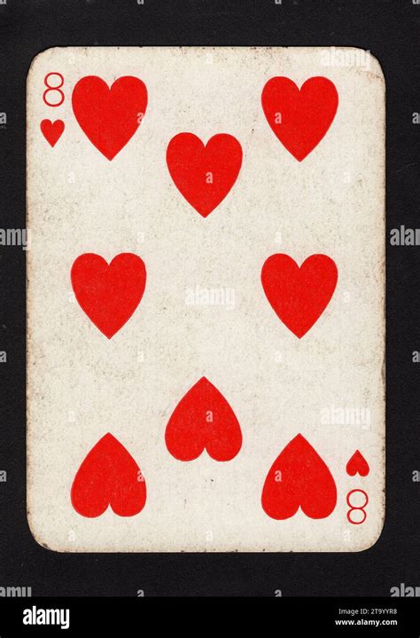 A Vintage Eight Of Hearts Playing Card Isolated On A Black Background