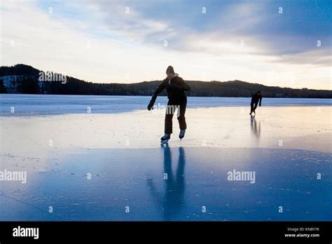 Ice Skating On Frozen Lake Northern Sweden Stock Photo Alamy