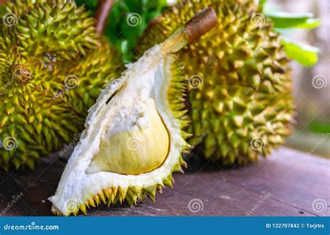 Durian Riped And Fresh Durian Peel With Yellow Colour On Wooden Stock