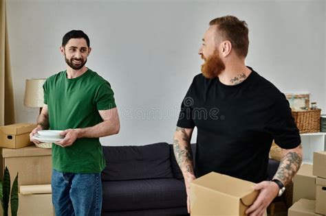 Two Men A Gay Couple Unpacking Stock Photo Image Of House Home