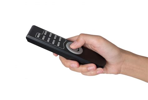 Woman Hand Holding Remote Control Isolated On White Premium Photo