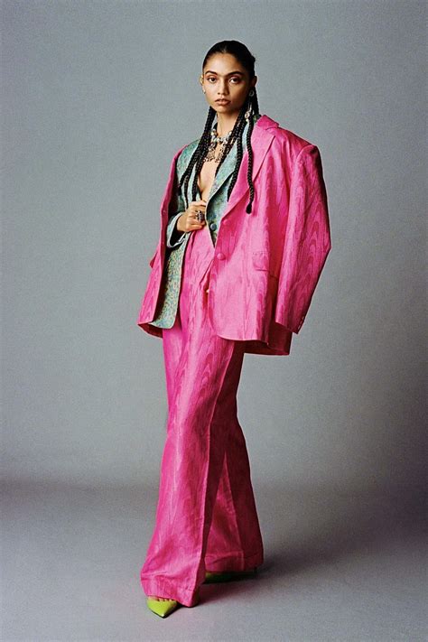 Download Chic And Stylish Pink Fashion Outfit Wallpaper