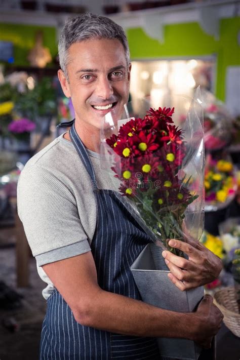 Male Florist Holding Bunch Red Sunflower Vase Stock Photos Free