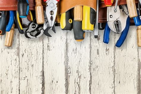 Premium Photo Tool Belt With Tools On Wooden Desk