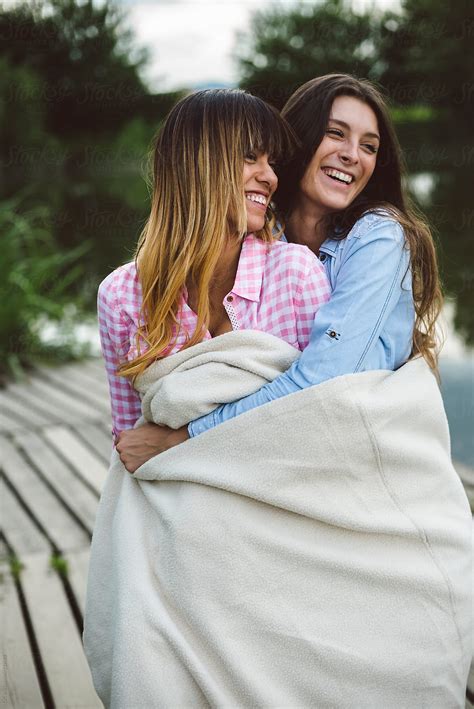 Friends Having Fun Together Outdoors By Stocksy Contributor Simone