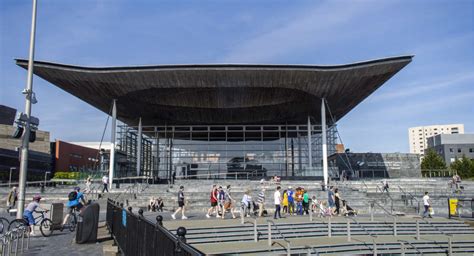 Front view of The Senedd (Welsh National Assembly building) in a sunny ...