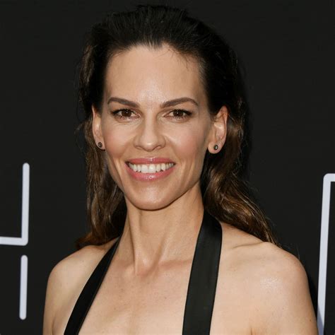 Hilary Swank 49 Sizzles In Waist Cinching Red Gown In Head Turning
