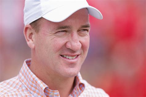 Former Denver Bronco Peyton Manning Reacts To Brad Paisley Saying