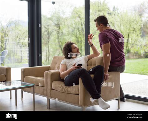 Gay Couple Love Home Concept Gay Couple Enjoying Leisure Time In Living Room Stock Photo Alamy