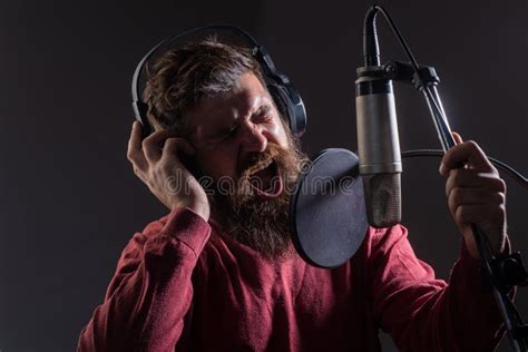 Man With Microphone Singing Song Musician In Music Hall Funny Guy