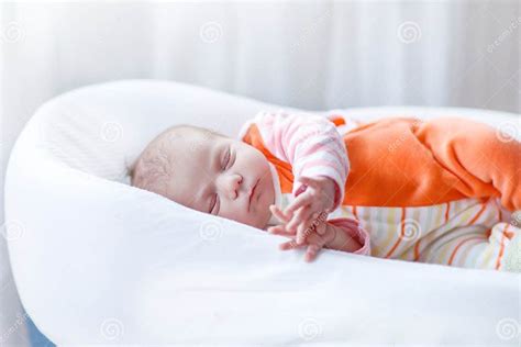 Portrait Of Cute Adorable Newborn Baby Girl Sleeping Stock Image